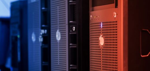 Close-up of blue and orange server racks with ventilation grilles
