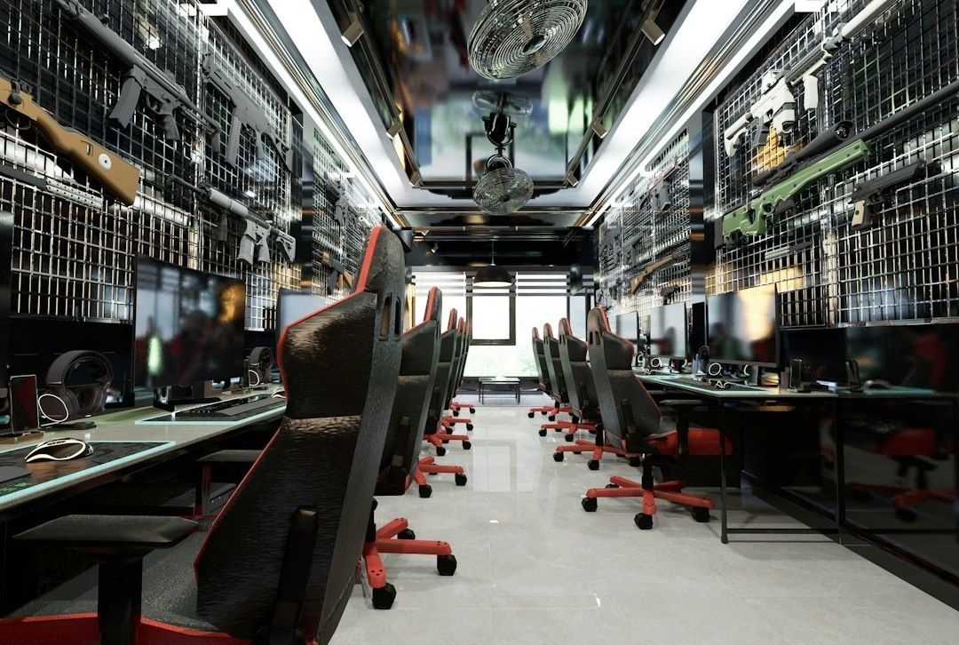 Computer-filled operations room with gaming chairs and wall-mounted equipment